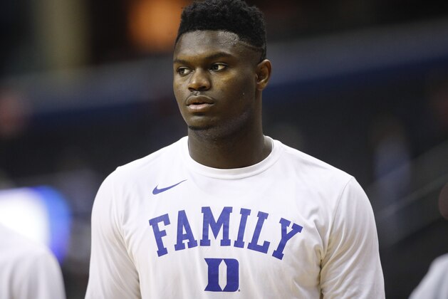FILE - In this March 31, 2019, file photo, Duke forward Zion Williamson warms up before the start of an NCAA men's East Regional final college basketball game against Michigan State, in Washington. The player widely projected to be the NBA draft’s top overall pick came up at a college basketball corruption trial as jurors heard a recording of a Clemson coach who seemed eager for help recruiting him. The charismatic Zion Williamson played one year at Duke before entering the draft scheduled for June. (AP Photo/Patrick Semansky, File)