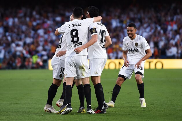SEVILLE, SPAIN - MAY 25: Kevin Gameiro of Valencia CF celebrates with his team mates after scoring his team's first goal during the Spanish Copa del Rey match between Barcelona and Valencia at Estadio Benito Villamarin on May 25, 2019 in Seville, . (Photo by Denis Doyle/Getty Images)