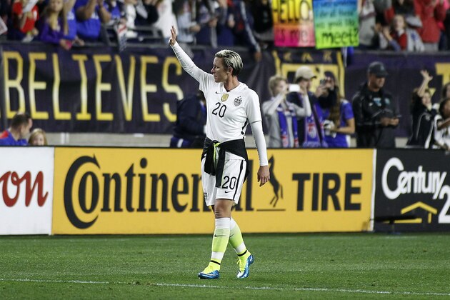 United States' Abby Wambach waves farewell to fans following a 2-0 win against China during an international friendly soccer match, Sunday, Dec. 13, 2015, in Glendale, AZ. Wambach will retire after the final game of the U.S. Women's Nation team's 2015 Victory Tour. (AP Photo/Ralph Freso)