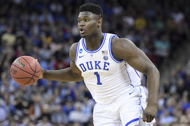 Duke forward Zion Williamson (1) dribbles the ball during the first half of a second-round game in the NCAA men's college basketball tournament Sunday, March 24, 2019, in Columbia, S.C. Duke defeated Central Florida 77-76. (AP Photo/Sean Rayford)