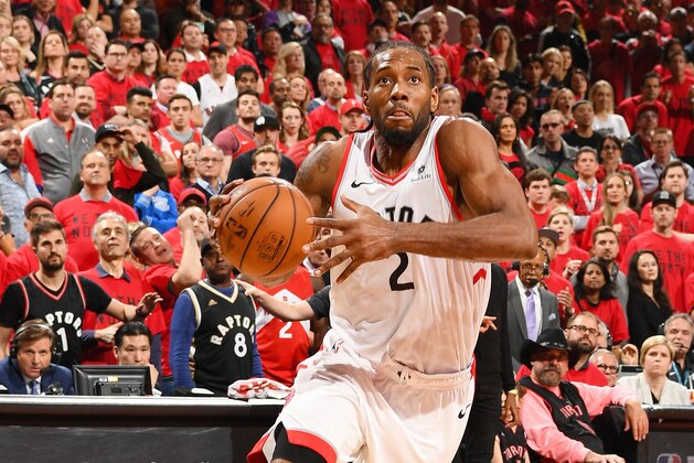 TORONTO, CANADA - MAY 25: Kawhi Leonard #2 of the Toronto Raptors drives through the paint during the game against the Milwaukee Bucks during Game Six of the Eastern Conference Finals on May 25, 2019 at Scotiabank Arena in Toronto, Ontario, Canada. NOTE TO USER: User expressly acknowledges and agrees that, by downloading and/or using this photograph, user is consenting to the terms and conditions of the Getty Images License Agreement. Mandatory Copyright Notice: Copyright 2019 NBAE (Photo by Ron Turenne/NBAE via Getty Images)