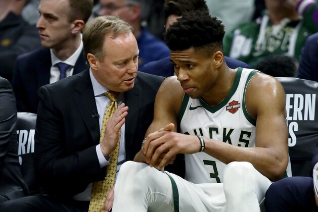 MILWAUKEE, WISCONSIN - MAY 17: Head coach Mike Budenholzer of the Milwaukee Bucks meets with Giannis Antetokounmpo #34 in the third quarter against the Toronto Raptors during Game Two of the Eastern Conference Finals of the 2019 NBA Playoffs at the Fiserv Forum on May 17, 2019 in Milwaukee, Wisconsin. NOTE TO USER: User expressly acknowledges and agrees that, by downloading and or using this photograph, User is consenting to the terms and conditions of the Getty Images License Agreement. (Photo by Jonathan Daniel/Getty Images) MILWAUKEE, WISCONSIN - MAY 17: Head coach Mike Budenholzer of the Milwaukee Bucks meets with Giannis Antetokounmpo #34 in the third quarter against the Toronto Raptors during Game Two of the Eastern Conference Finals of the 2019 NBA Playoffs at the Fiserv Forum on May 17, 2019 in Milwaukee, Wisconsin. NOTE TO USER: User expressly acknowledges and agrees that, by downloading and or using this photograph, User is consenting to the terms and conditions of the Getty Images License Agreement. (Photo by Jonathan Daniel/Getty Images)