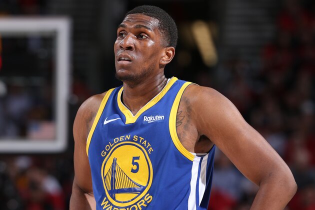 PORTLAND, OR - MAY 20:  Kevon Looney #5 of the Golden State Warriors looks on during Game Four of the Western Conference Finals against the Portland Trail Blazers on May 20, 2019 at the Moda Center in Portland, Oregon. NOTE TO USER: User expressly acknowledges and agrees that, by downloading and/or using this photograph, user is consenting to the terms and conditions of the Getty Images License Agreement. Mandatory Copyright Notice: Copyright 2019 NBAE (Photo by Sam Forencich/NBAE via Getty Images)