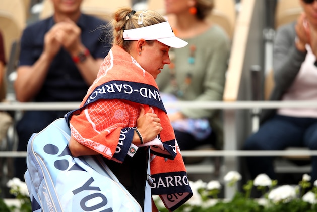 PARIS, FRANCE - MAY 26: Angelique Kerber of Germany leaves the court following defeat in her ladies singles first round match against Anastasia Potapova of Russia during Day one of the 2019 French Open at Roland Garros on May 26, 2019 in Paris, France. (Photo by Clive Brunskill/Getty Images)