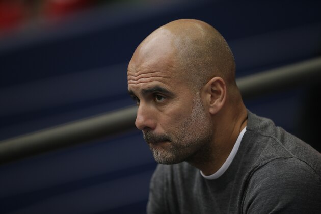Manchester City's manager Pep Guardiola stands on the touchline before the English FA Cup Final soccer match between Manchester City and Watford at Wembley stadium in London, Saturday, May 18, 2019. (AP Photo/Tim Ireland)