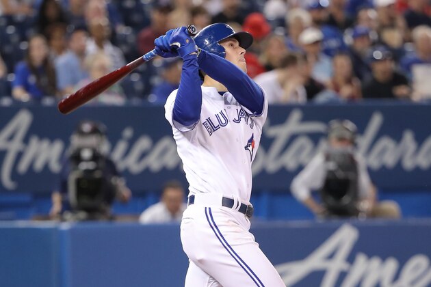 TORONTO, ON - MAY 26: Cavan Biggio #8 of the Toronto Blue Jays hits his first career MLB home run, a solo shot, in the fourth inning against the San Diego Padres at Rogers Centre on May 26, 2019 in Toronto, Canada. (Photo by Tom Szczerbowski/Getty Images)
