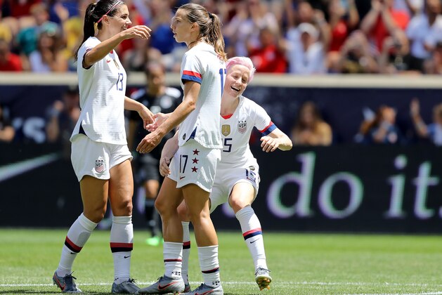 HARRISON, NEW JERSEY - MAY 26:  Tobin Heath #17 of the United States is congratulated by teammates Megan Rapinoe #15 and Alex Morgan #13 after she scored in the first half against Mexico at Red Bull Arena on May 26, 2019 in Harrison, New Jersey. (Photo by Elsa/Getty Images)