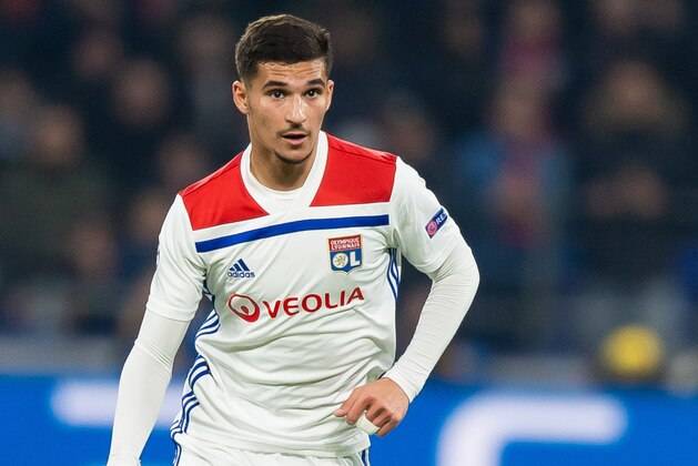 LYON, FRANCE - FEBRUARY 19: Houssem Aouar of Olympique Lyon controls the ball during the UEFA Champions League Round of 16 First Leg match between Olympique Lyonnais and FC Barcelona at Groupama Stadium on February 19, 2019 in Lyon, France. (Photo by TF-Images/TF-Images via Getty Images)