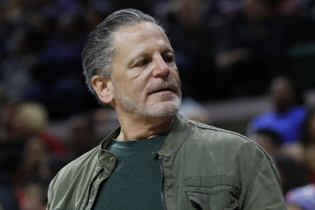 FILE- In an Oct. 12, 2018 file photo, Quicken Loans and Rock Ventures founder Dan Gilbert is seen during a basketball game in East Lansing, Mich. Gilbert is starting a ballot drive as a