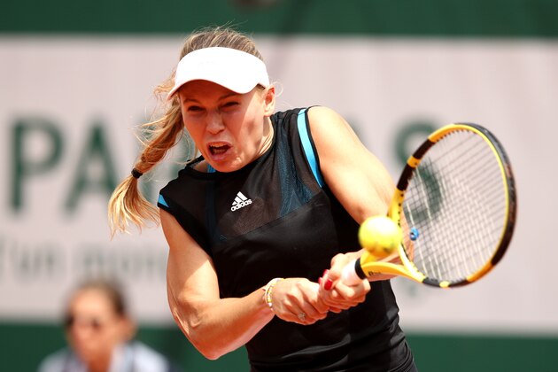 PARIS, FRANCE - MAY 27: Caroline Wozniacki of Denmark returns the ball during her ladies singles first round match against Veronika Kudermetova of Russia during Day two of the 2019 French Open at Roland Garros on May 27, 2019 in Paris, France. (Photo by Adam Pretty/Getty Images)