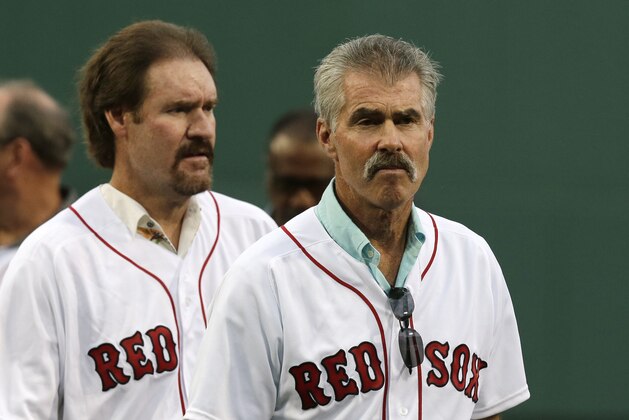 Former Boston Red Sox's players Bill Buckner, right, and Wade Boggs prior to a baseball game against the Colorado Rockies in Boston, Wednesday, May 25, 2016.  The Red Sox defeated the Rockies 8-3. (AP Photo/Charles Krupa)