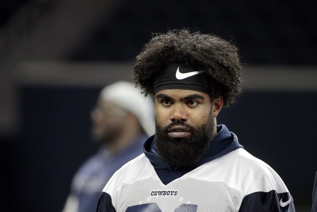 Dallas Cowboys running back Ezekiel Elliott (21) walks off the field after NFL football practice in Frisco, Texas, Wednesday, May. 22, 2019. (AP Photo/Michael Ainsworth)