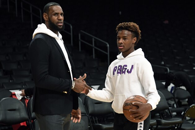 LOS ANGELES, CA - DECEMBER 28: LeBron James #23 of the Los Angeles Lakers and his son LeBron James Jr., on the court after the Los Angeles Clippers and Los Angeles Lakers basketball game at Staples Center on December 28, 2018 in Los Angeles, California. NOTE TO USER: User expressly acknowledges and agrees that, by downloading and or using this photograph, User is consenting to the terms and conditions of the Getty Images License Agreement. (Photo by Kevork Djansezian/Getty Images)