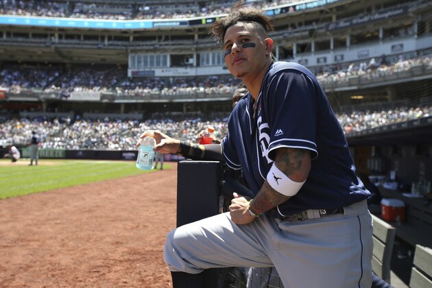 San Diego Padres' Manny Machado stands in the dugout during the second inning of a baseball game against the New York Yankees, Monday, May 27, 2019, in New York. (AP Photo/Michael Owens)