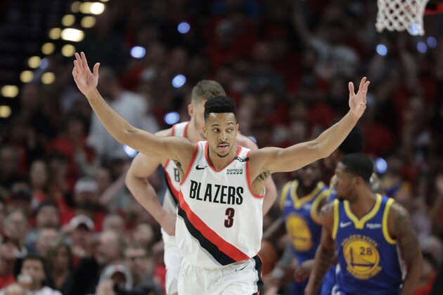 Portland Trail Blazers guard CJ McCollum (3) reacts after a play against the Golden State Warriors during the first half of Game 4 of the NBA basketball playoffs Western Conference finals, Monday, May 20, 2019, in Portland, Ore. (AP Photo/Ted S. Warren)