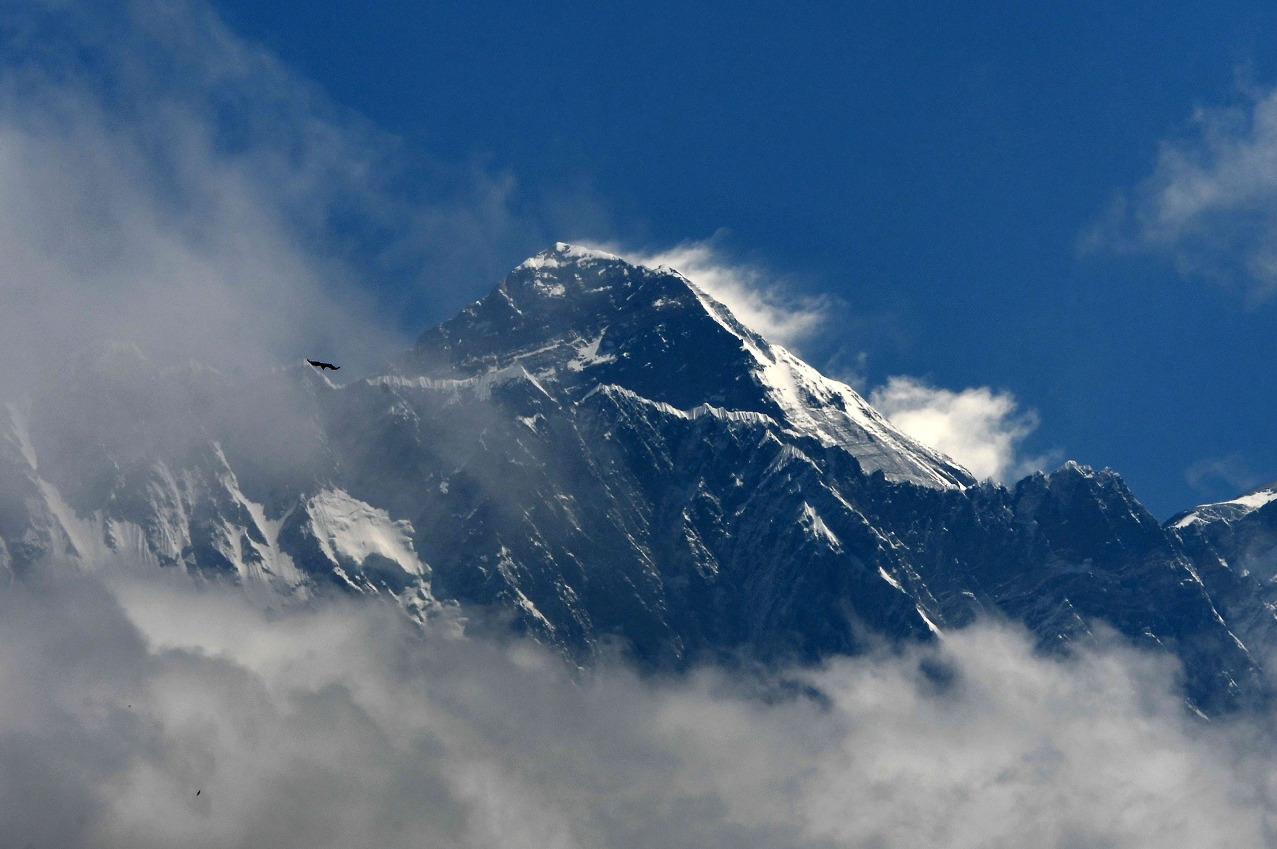 Mount Everest (height 8848 metres) is seen in the Everest region, some 140 km northeast of Kathmandu, on May 27, 2019. - Ten people have died in little more than two weeks after poor weather cut the climbing window, leaving mountaineers waiting in long queues to the summit, risking exhaustion and running out of oxygen. (Photo by PRAKASH MATHEMA / AFP)        (Photo credit should read PRAKASH MATHEMA/AFP/Getty Images)