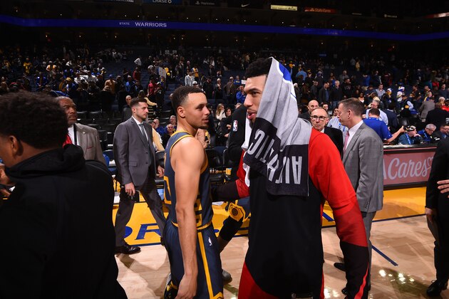 OAKLAND, CA - DECEMBER 12: Stephen Curry #30 of the Golden State Warriors and Danny Green #14 of the Toronto Raptors hug after a game on December 12, 2018 at ORACLE Arena in Oakland, California. NOTE TO USER: User expressly acknowledges and agrees that, by downloading and or using this photograph, user is consenting to the terms and conditions of Getty Images License Agreement. Mandatory Copyright Notice: Copyright 2018 NBAE (Photo by Noah Graham/NBAE via Getty Images)