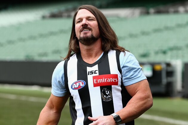MELBOURNE, AUSTRALIA - JUNE 24: Smackdown women's champion Carmella and WWE'S world champion AJ Styles show their football skills at the Melbourne Cricket Ground on June 24, 2018 in Melbourne, Australia. (Photo by Robert Prezioso/Getty Images)