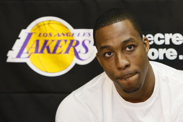 Los Angeles Lakers center Dwight Howard talks to reporters in El Segundo, Calif., Tuesday, April 30, 2013. The Lakes lost their first-round NBA basketball playoff series to the San Antonio Spurs. (AP Photo/Damian Dovarganes)
