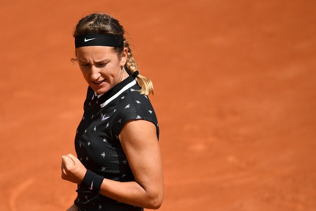 Belarus' Victoria Azarenka reacts as she plays against Latvia's Jelena Ostapenko during their women's singles first round match on day three of The Roland Garros 2019 French Open tennis tournament in Paris on May 28, 2019. (Photo by Anne-Christine POUJOULAT / AFP)        (Photo credit should read ANNE-CHRISTINE POUJOULAT/AFP/Getty Images)
