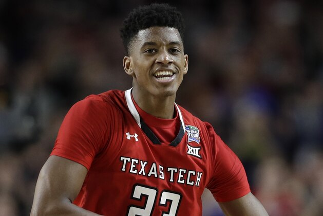 Texas Tech's Jarrett Culver (23) reacts during the second half in the championship of the Final Four NCAA college basketball tournament against Virginia, Monday, April 8, 2019, in Minneapolis. (AP Photo/David J. Phillip)
