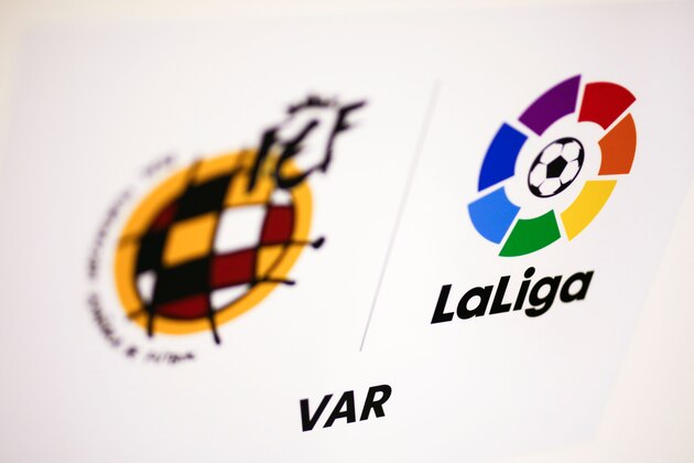 A picture shows logos of the Spanish Football Federation, the Spanish League and the Video assistant referee (VAR) during the Spanish league football match between Real Valladolid and FC Barcelona at the Jose Zorrilla Stadium in Valladolid on August 25, 2018. (Photo by Benjamin CREMEL / AFP)        (Photo credit should read BENJAMIN CREMEL/AFP/Getty Images)