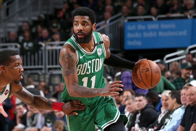 MILWAUKEE, WI - MAY 8: Kyrie Irving #11 of the Boston Celtics handles the ball against the Milwaukee Bucks during Game Five of the Eastern Conference Semifinals of the 2019 NBA Playoffs on May 8, 2019 at the Fiserv Forum in Milwaukee, Wisconsin. NOTE TO USER: User expressly acknowledges and agrees that, by downloading and/or using this photograph, user is consenting to the terms and conditions of the Getty Images License Agreement. Mandatory Copyright Notice: Copyright 2019 NBAE (Photo by Gary Dineen/NBAE via Getty Images)