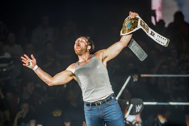 Dean Ambrose celebrates victory over the Wiz during the WWE show at Zenith Arena on may 09, 2017 in Lille, north France. / AFP PHOTO / PHILIPPE HUGUEN        (Photo credit should read PHILIPPE HUGUEN/AFP/Getty Images)