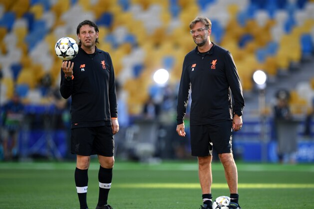 KIEV, UKRAINE - MAY 25: Jurgen Klopp, Manager of Liverpool (R) and Peter Krawietz assistant coach of Liverpool look on during a Liverpool training session ahead of the UEFA Champions League Final against Real Madrid at NSC Olimpiyskiy Stadium on May 25, 2018 in Kiev, Ukraine. (Photo by Shaun Botterill/Getty Images) KIEV, UKRAINE - MAY 25: Jurgen Klopp, Manager of Liverpool (R) and Peter Krawietz assistant coach of Liverpool look on during a Liverpool training session ahead of the UEFA Champions League Final against Real Madrid at NSC Olimpiyskiy Stadium on May 25, 2018 in Kiev, Ukraine. (Photo by Shaun Botterill/Getty Images)