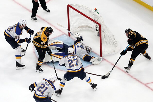 BOSTON, MASSACHUSETTS - MAY 27:  Jordan Binnington #50 of the St. Louis Blues stops a shot against Patrice Bergeron #37 of the Boston Bruins in Game One of the 2019 NHL Stanley Cup Final at TD Garden on May 27, 2019 in Boston, Massachusetts. (Photo by Patrick Smith/Getty Images)