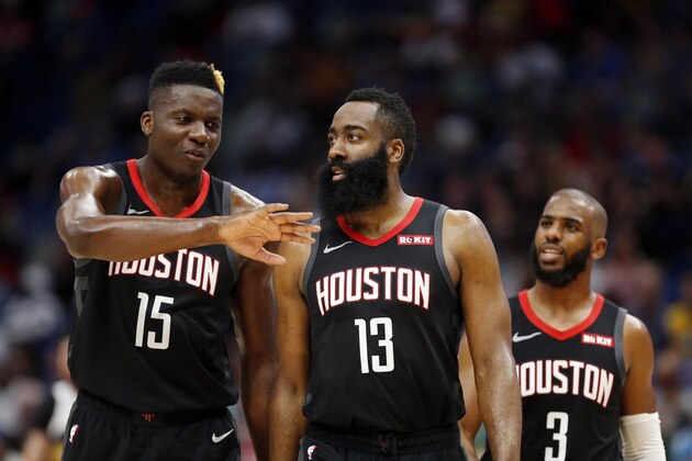 Houston Rockets center Clint Capela (15) Houston Rockets guard James Harden (13) and Houston Rockets guard Chris Paul (3) during the second half of an NBA basketball game in New Orleans, Sunday, March 24, 2019. The Rockets won 113-90. (AP Photo/Tyler Kaufman)