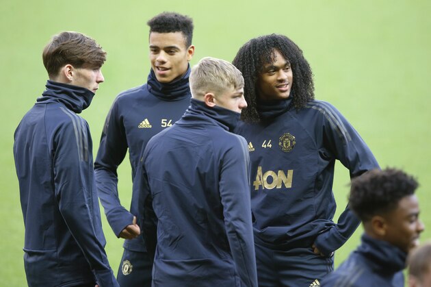 From left to right, Manchester United's James Garner, Mason Greenwood, Brandon Williams and Tahith Chong arrives for a training session at Stade des Princes stadium in Paris, Tuesday, march 5, 2019. Manchester United will play PSG in a Champions League match on Wednesday march 6. (AP Photo/Michel Euler)