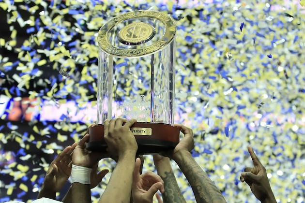 NASHVILLE, TENNESSEE - MARCH 17: The Auburn Tigers  hold the winner's trophy after the 84-64 win against the Tennessee Volunteers during the final of the SEC Basketball Championships at Bridgestone Arena on March 17, 2019 in Nashville, Tennessee. (Photo by Andy Lyons/Getty Images)