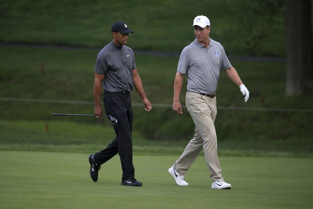 DUBLIN, OHIO - MAY 29: Tiger Woods and Peyton Manning walk down the fairway on the first hole during the Pro -Am of The Memorial Tournament  presented by Nationwide at Muirfield Village Golf Club on May 29, 2019 in Dublin, Ohio. (Photo by Andy Lyons/Getty Images)