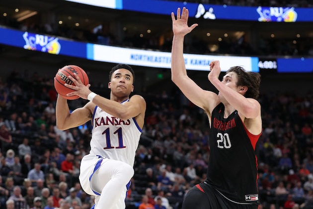 SALT LAKE CITY, UTAH - MARCH 21: Devon Dotson #11 of the Kansas Jayhawks drives to the basket against Bolden Brace #20 of the Northeastern Huskies during the second half in the first round of the 2019 NCAA Men's Basketball Tournament at Vivint Smart Home Arena on March 21, 2019 in Salt Lake City, Utah. (Photo by Patrick Smith/Getty Images)