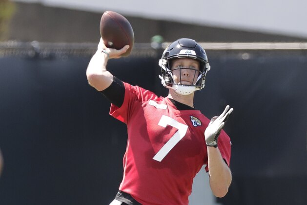 Jacksonville Jaguars quarterback Nick Foles (7) throws a pass during an NFL football practice, Tuesday, May 21, 2019, in Jacksonville, Fla. (AP Photo/John Raoux)