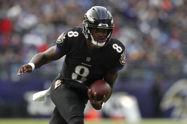 BALTIMORE, MD - NOVEMBER 18: Quarterback Lamar Jackson #8 of the Baltimore Ravens runs with the ball in the first quarter against the Cincinnati Bengals at M&T Bank Stadium on November 18, 2018 in Baltimore, Maryland. (Photo by Todd Olszewski/Getty Images)