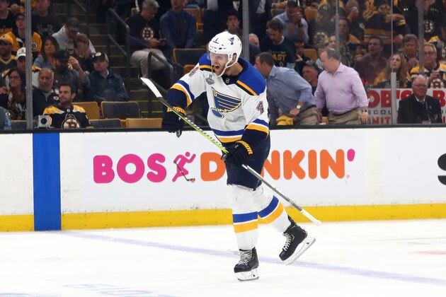 BOSTON, MASSACHUSETTS - MAY 29:  Carl Gunnarsson #4 of the St. Louis Blues celebrates his game-winning goal during the first overtime period to defeat the Boston Bruins 3-2 in Game Two of the 2019 NHL Stanley Cup Final at TD Garden on May 29, 2019 in Boston, Massachusetts. (Photo by Adam Glanzman/Getty Images)