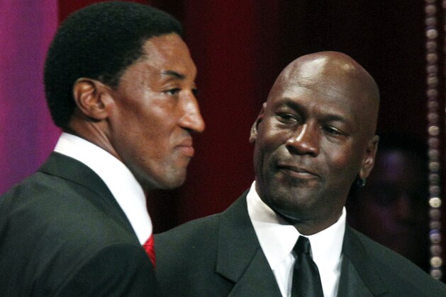 2010 Basketball Hall of Fame inductee Scottie Pippen, left, stands with former teammate Michael Jordan during the enshrinement ceremony in Springfield, Mass. Friday, Aug. 13, 2010. (AP Photo/Elise Amendola)