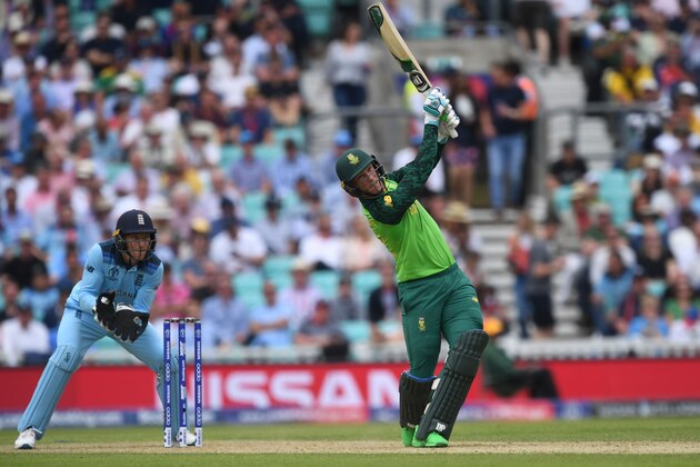 South Africa's Rassie van der Dussen (R) plays a shot as England's wicketkeeper Jos Buttler looks on during the 2019 Cricket World Cup group stage match between England and South Africa at The Oval in London on May 30, 2019. (Photo by Dibyangshu SARKAR / AFP) / RESTRICTED TO EDITORIAL USE        (Photo credit should read DIBYANGSHU SARKAR/AFP/Getty Images)