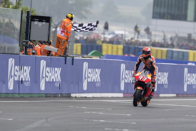 LE MANS, FRANCE - MAY 19: Marc Marquez of Spain and Repsol Honda Team cuts the finish lane and celebrates the victory  at the end of the MotoGP race during the MotoGp of France - Race on May 19, 2019 in Le Mans, France. (Photo by Mirco Lazzari gp/Getty Images)