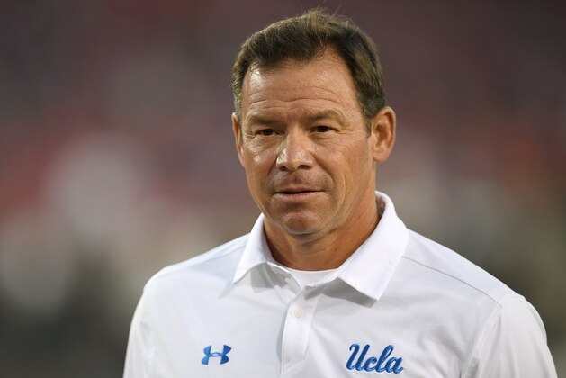 PALO ALTO, CA - SEPTEMBER 23:  Head coach Jim Mora of the UCLA Bruins looks on while his team warms up prior to playing the Stanford Cardinal in a NCAA football game at Stanford Stadium on September 23, 2017 in Palo Alto, California.  (Photo by Thearon W. Henderson/Getty Images)