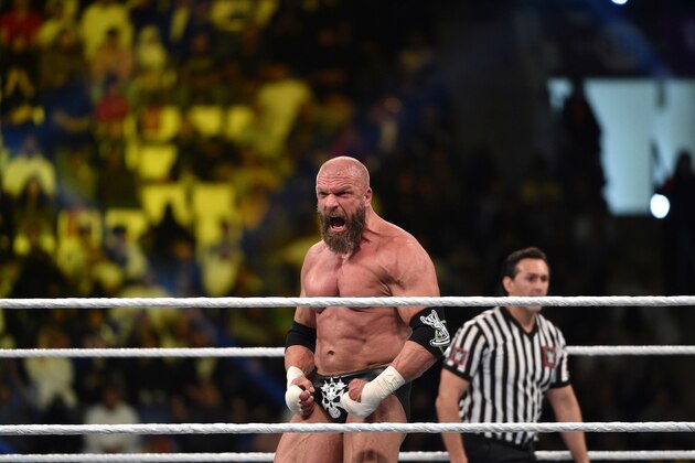 Triple H reacts during a tag team match as part of as part of the World Wrestling Entertainment (WWE) Crown Jewel pay-per-view at the King Saud University Stadium in Riyadh on November 2, 2018. (Photo by Fayez Nureldine / AFP)        (Photo credit should read FAYEZ NURELDINE/AFP/Getty Images)