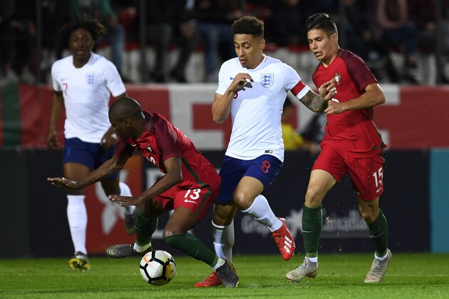 PENAFIEL, PORTUGAL - MARCH 26: Nuno Henrique of Portugal competes for the ball with Marcus Tavernier of England during the International Friendly match between Portugal U20 and England U20 at Stadium Municipal 25 April on March 26, 2019 in Penafiel, Portugal. (Photo by Octavio Passos/Getty Images)