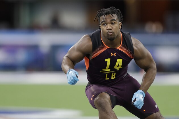 Texas A&M linebacker Tyrel Dodson runs a drill during the NFL football scouting combine, Sunday, March 3, 2019, in Indianapolis. (AP Photo/Darron Cummings)