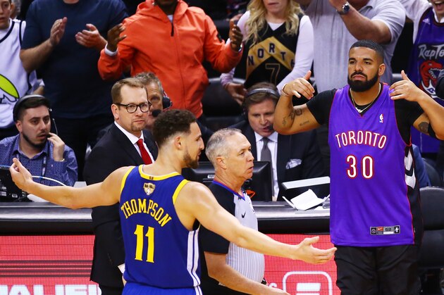 TORONTO, ONTARIO - MAY 30:  Drake reacts during Game One of the 2019 NBA Finals between the Golden State Warriors and the Toronto Raptors at Scotiabank Arena on May 30, 2019 in Toronto, Canada. NOTE TO USER: User expressly acknowledges and agrees that, by downloading and or using this photograph, User is consenting to the terms and conditions of the Getty Images License Agreement. (Photo by Vaughn Ridley/Getty Images)