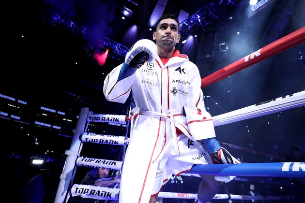 NEW YORK, NEW YORK - APRIL 20:  Amir Khan  enters the ring against Terence Crawford before their WBO welterweight title fight at Madison Square Garden on April 20, 2019 in New York City. (Photo by Al Bello/Getty Images)