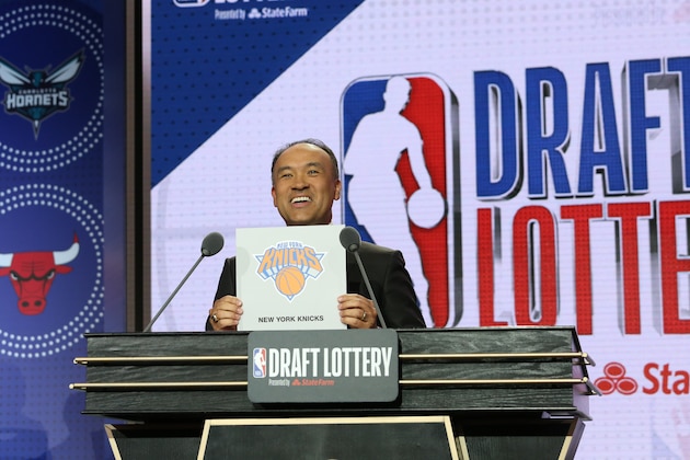 CHICAGO, IL - MAY 14: Deputy Commissioner of the NBA, Mark Tatum, holds up the card for the New York Knicks after they get the 3rd overall pick in the NBA Draft during the 2019 NBA Draft Lottery on May 14, 2019 at the Chicago Hilton in Chicago, Illinois. NOTE TO USER: User expressly acknowledges and agrees that, by downloading and/or using this photograph, user is consenting to the terms and conditions of the Getty Images License Agreement. Mandatory Copyright Notice: Copyright 2019 NBAE (Photo by Gary Dineen/NBAE via Getty Images)