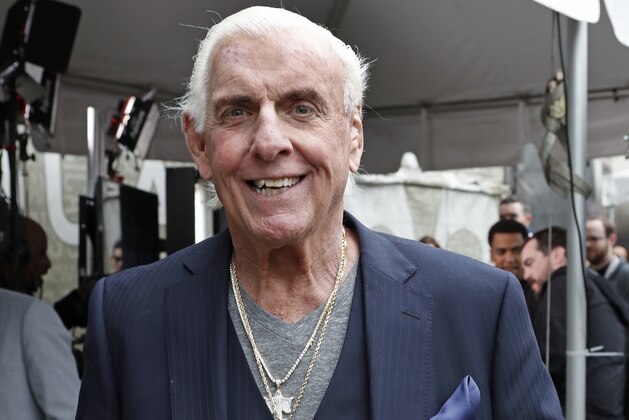 IMAGE DISTRIBUTED FOR XBOX - Ric Flair plays WWE 2K 18 on Xbox One X from Wrestlemania 34 on Sunday, April 8, 2018, in New Orleans. (Tyler Kaufman/AP Images for Xbox)