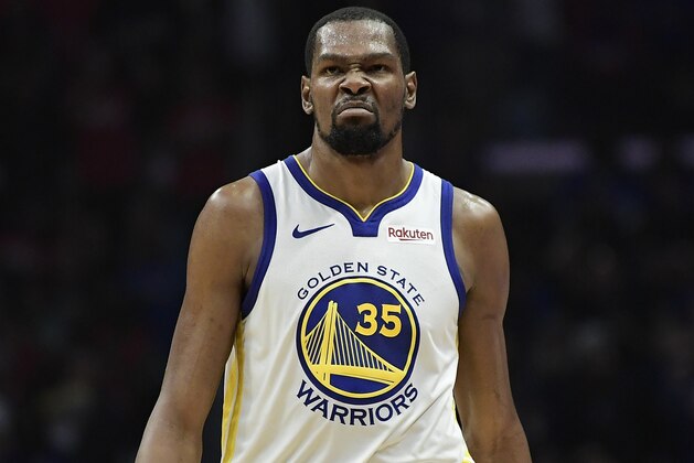 Golden State Warriors forward Kevin Durant scowls after scoring during the second half in Game 6 of a first-round NBA basketball playoff series against the Los Angeles Clippers Friday, April 26, 2019, in Los Angeles. The Warriors won 129-110. (AP Photo/Mark J. Terrill)